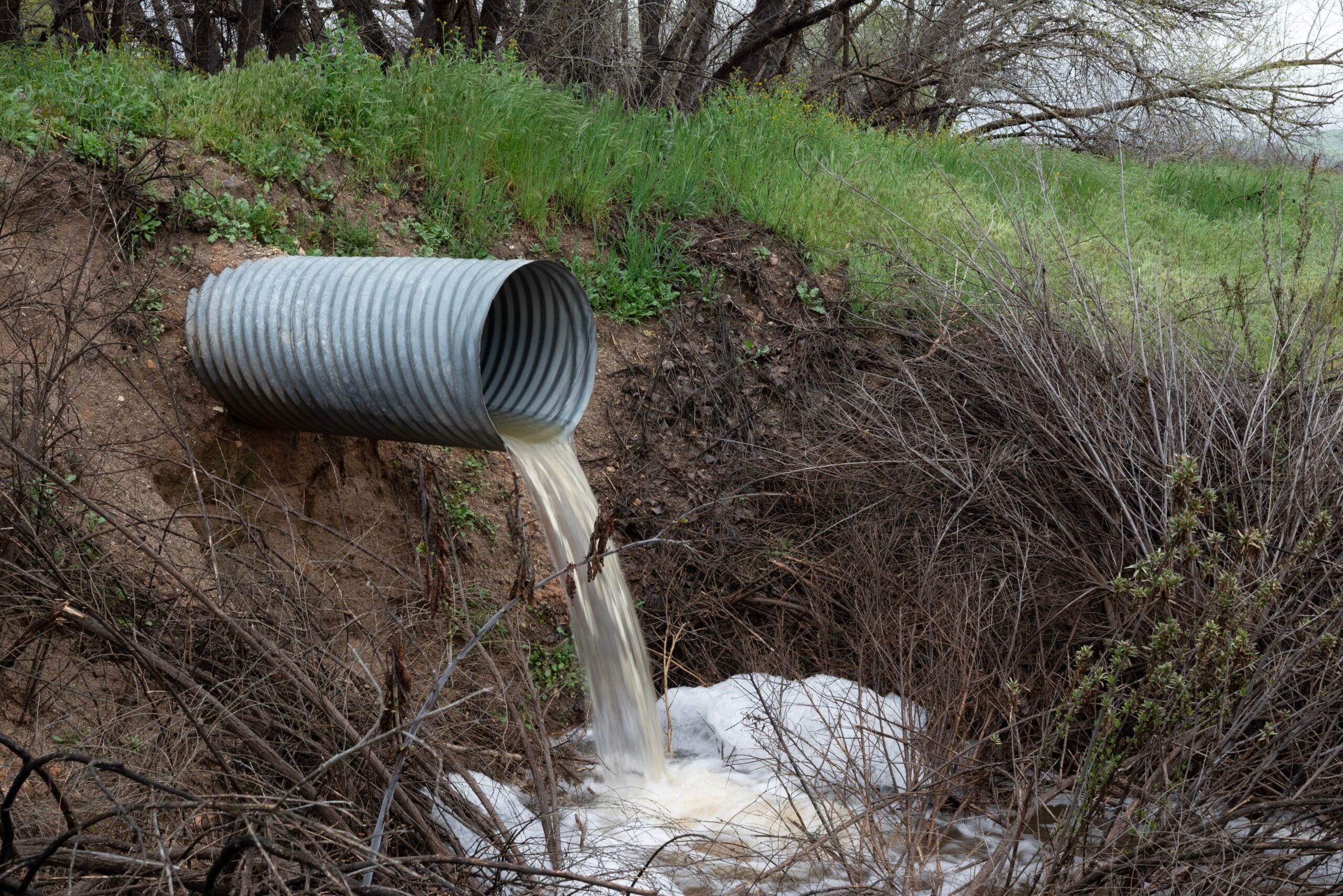 Close-up view of a sewer drain pipe, illustrating the type of underground plumbing inspected during a sewer camera inspection